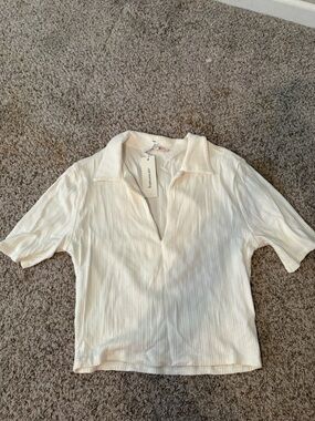 Francesca's Collections Cream Ribbed V-Neck Polo Top